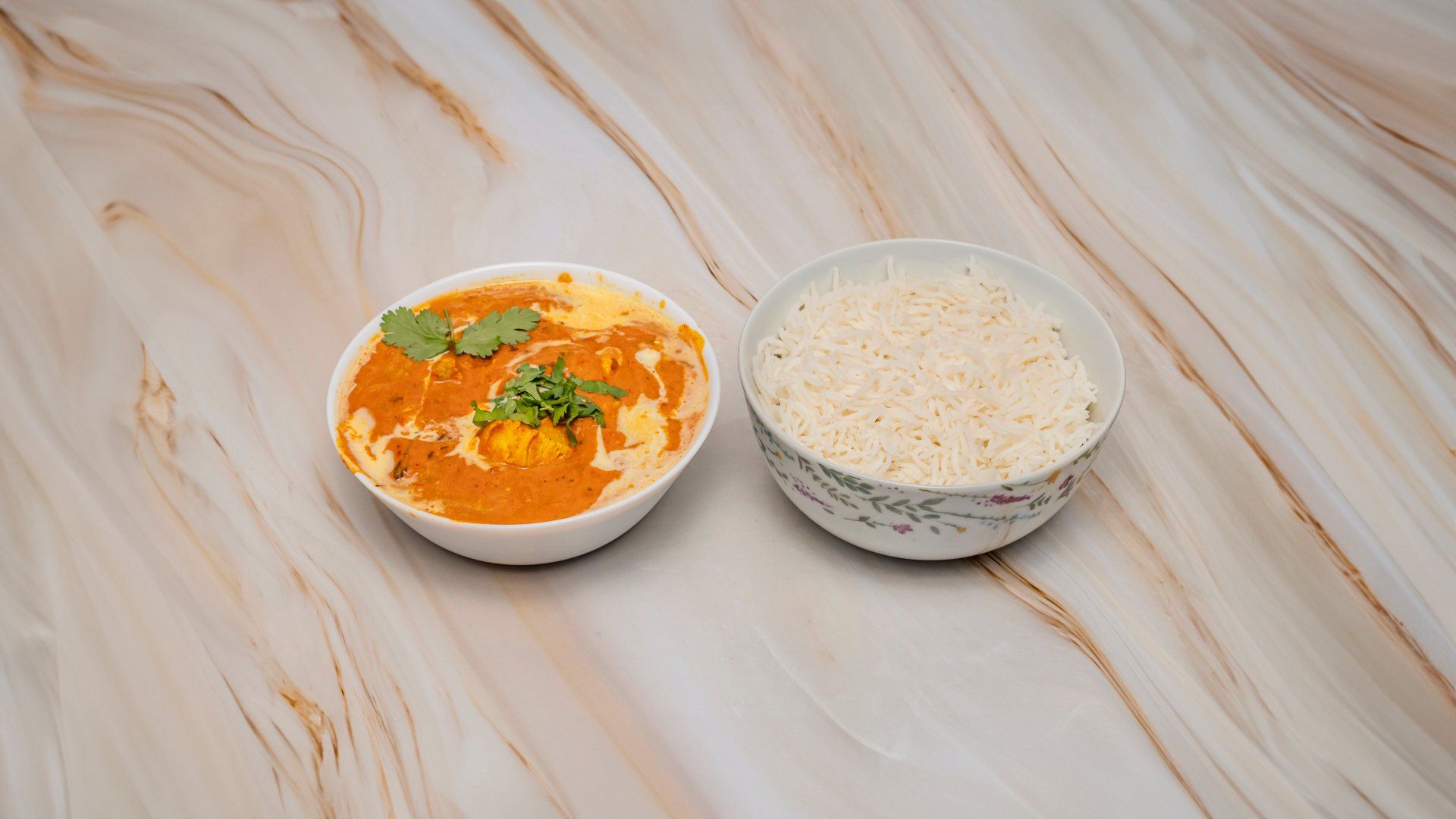Classic Butter Chicken with Aromatic Basmati Rice”