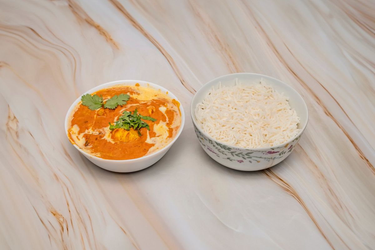 Classic Butter Chicken with Aromatic Basmati Rice”